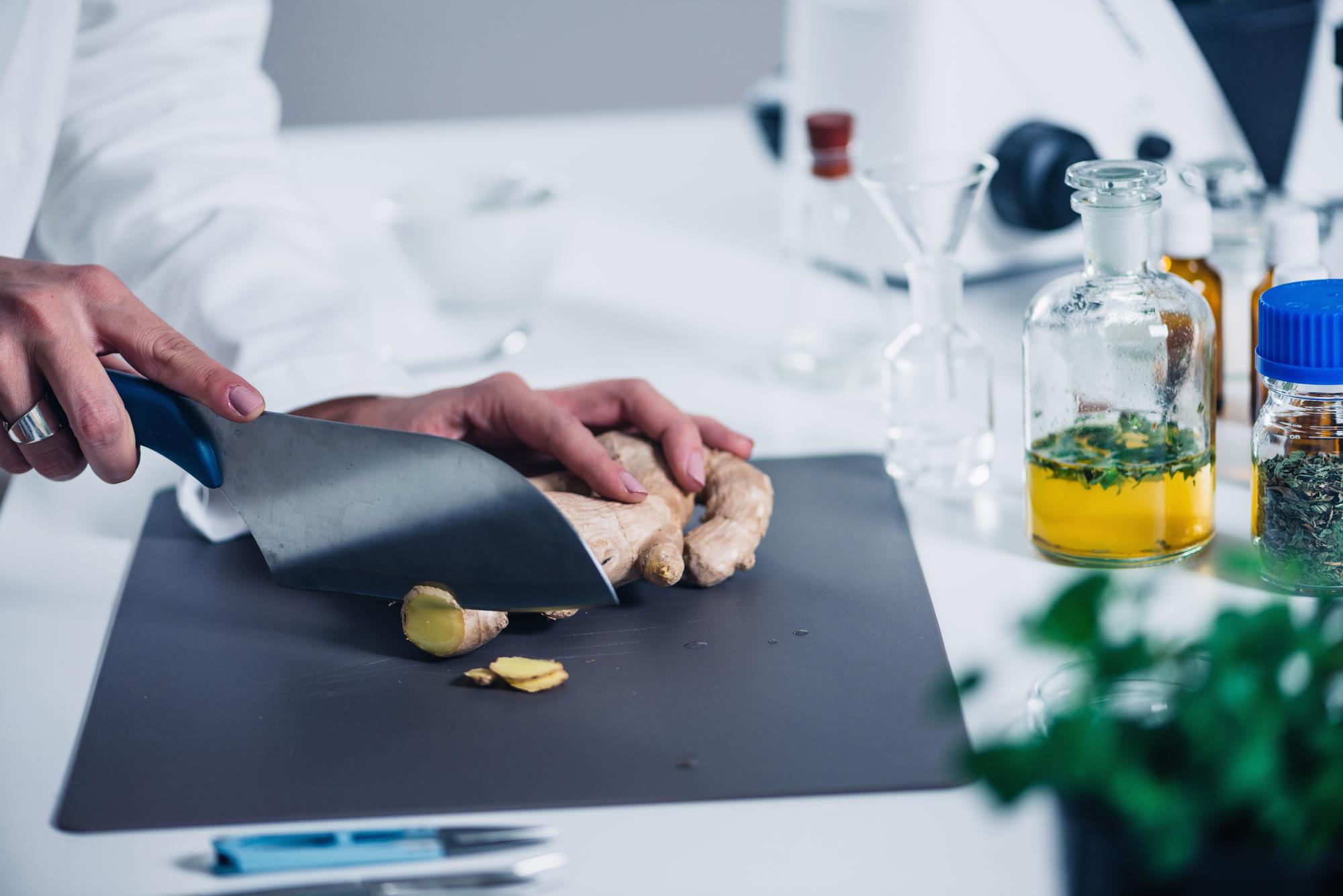 Chef testing texture in lab setting
